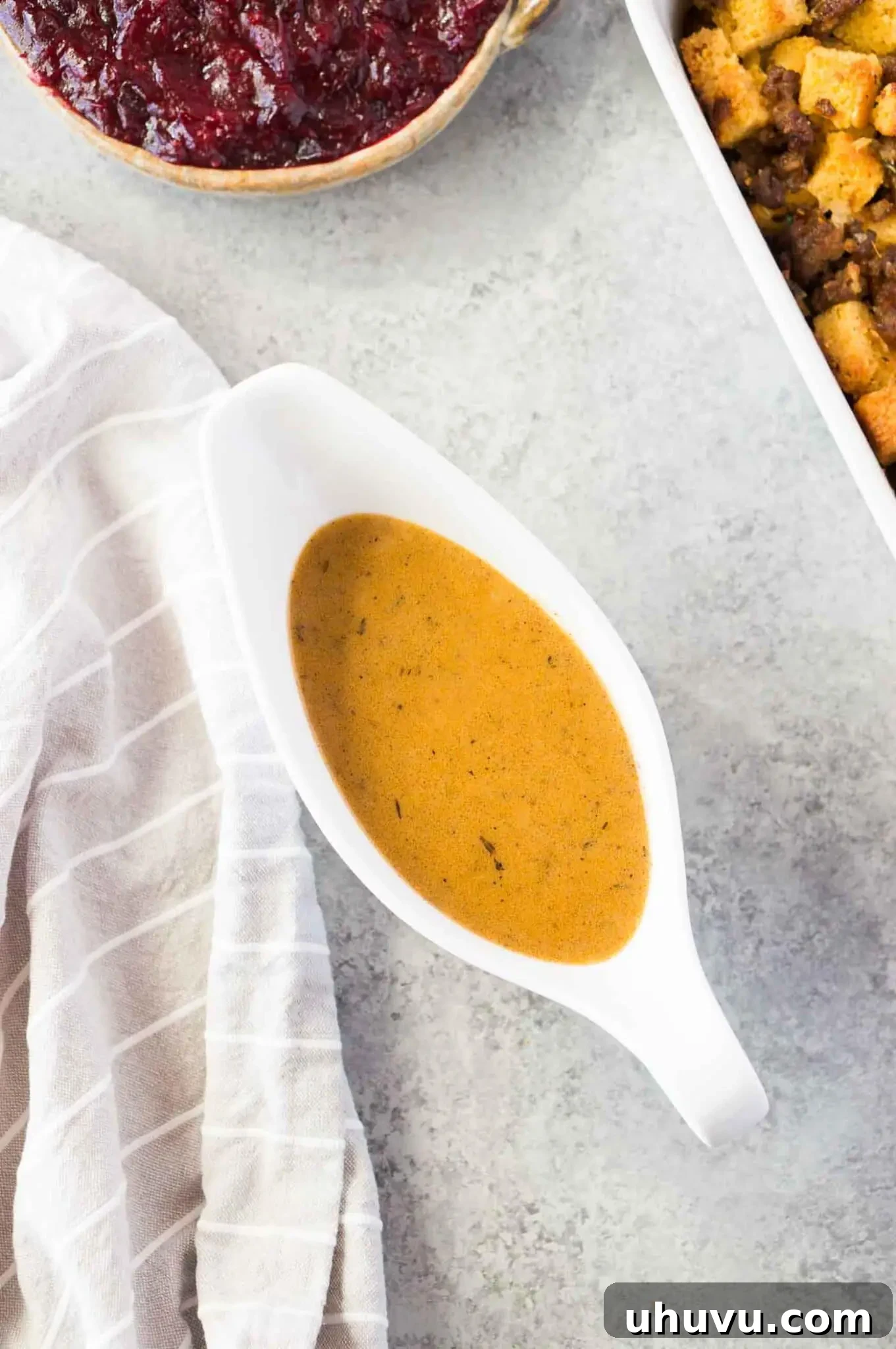easy homemade gravy made from drippings, served beautifully in a gravy boat