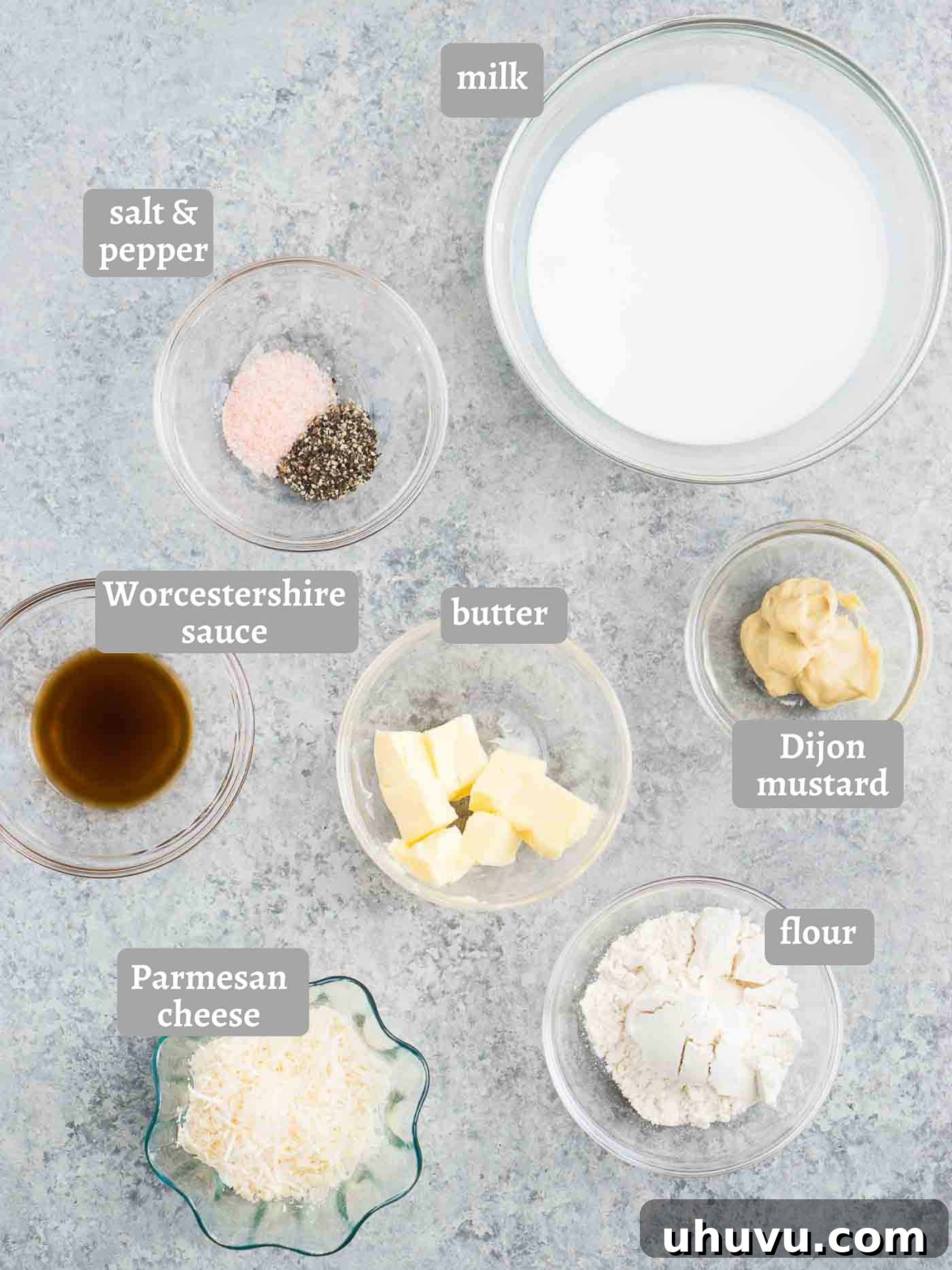 Ingredients for creamy Dijon sauce arranged on a table