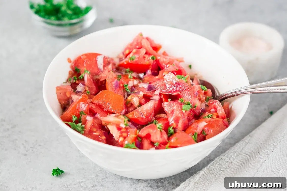 Fresh tomato salad prepared for a potluck gathering