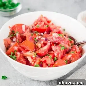 Delicious tomato salad, perfect for a potluck