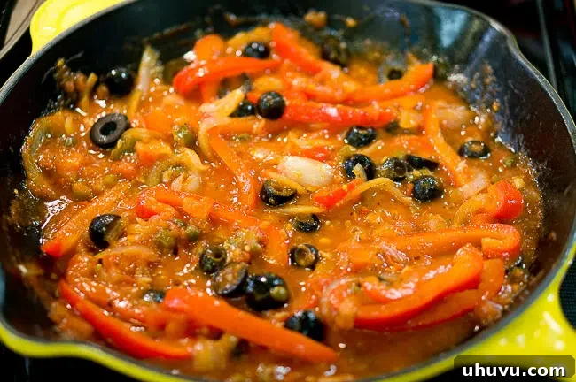 Preparing the Veracruz sauce in a skillet