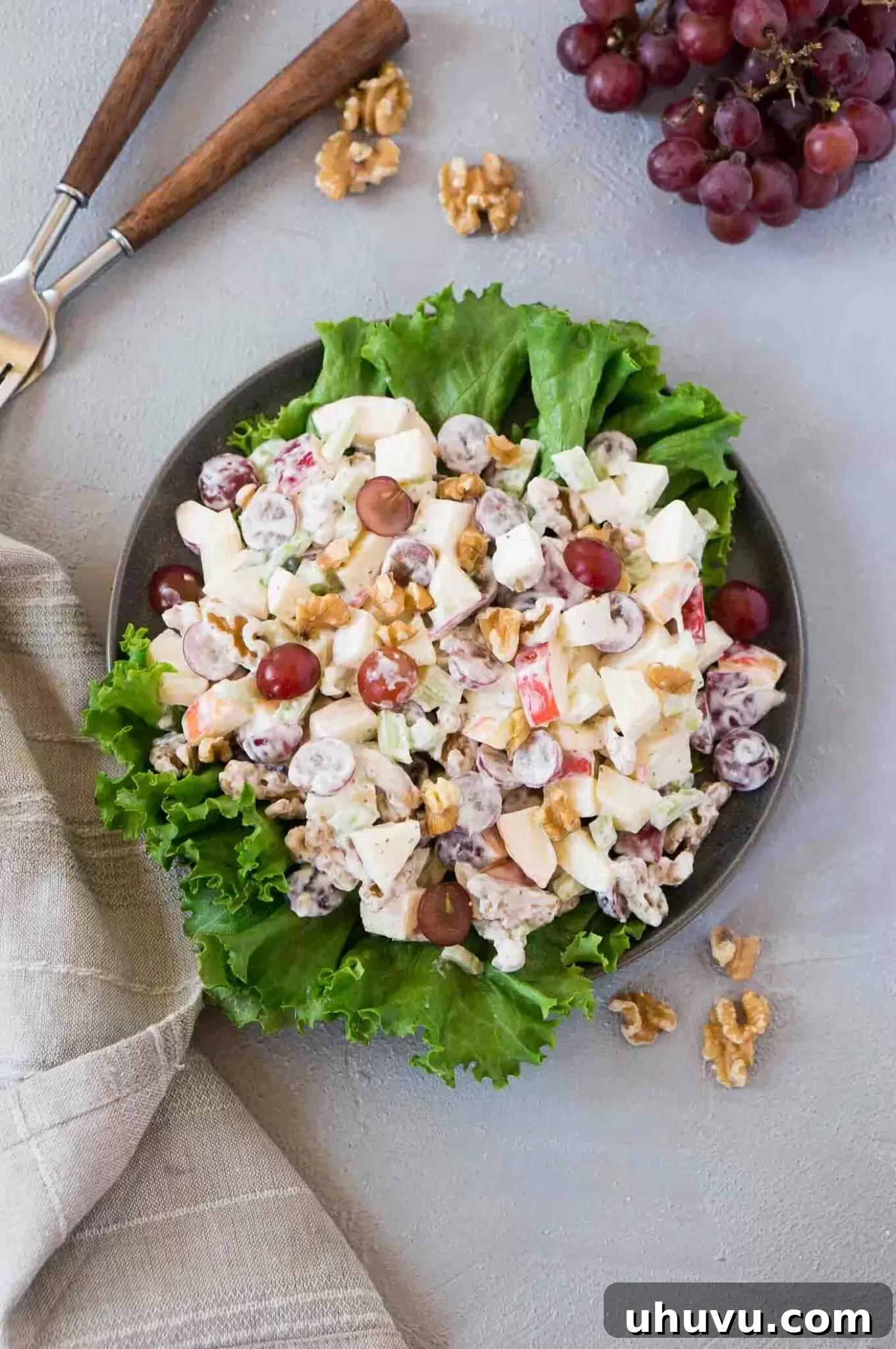 waldorf salad on a black plate from top