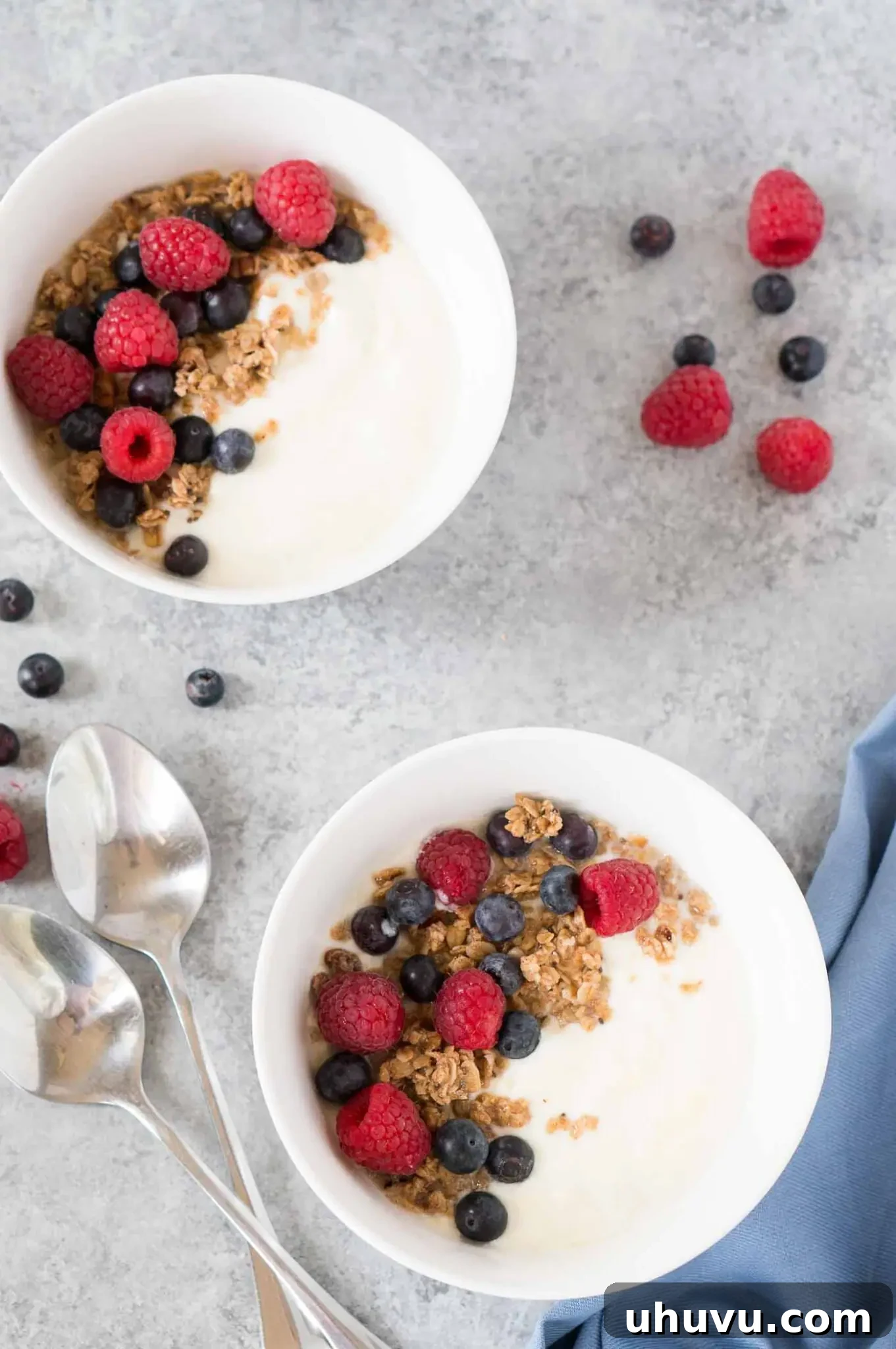 Multiple bowls of delightful Instant Pot yogurt, each adorned with delicious granola and fresh berries.