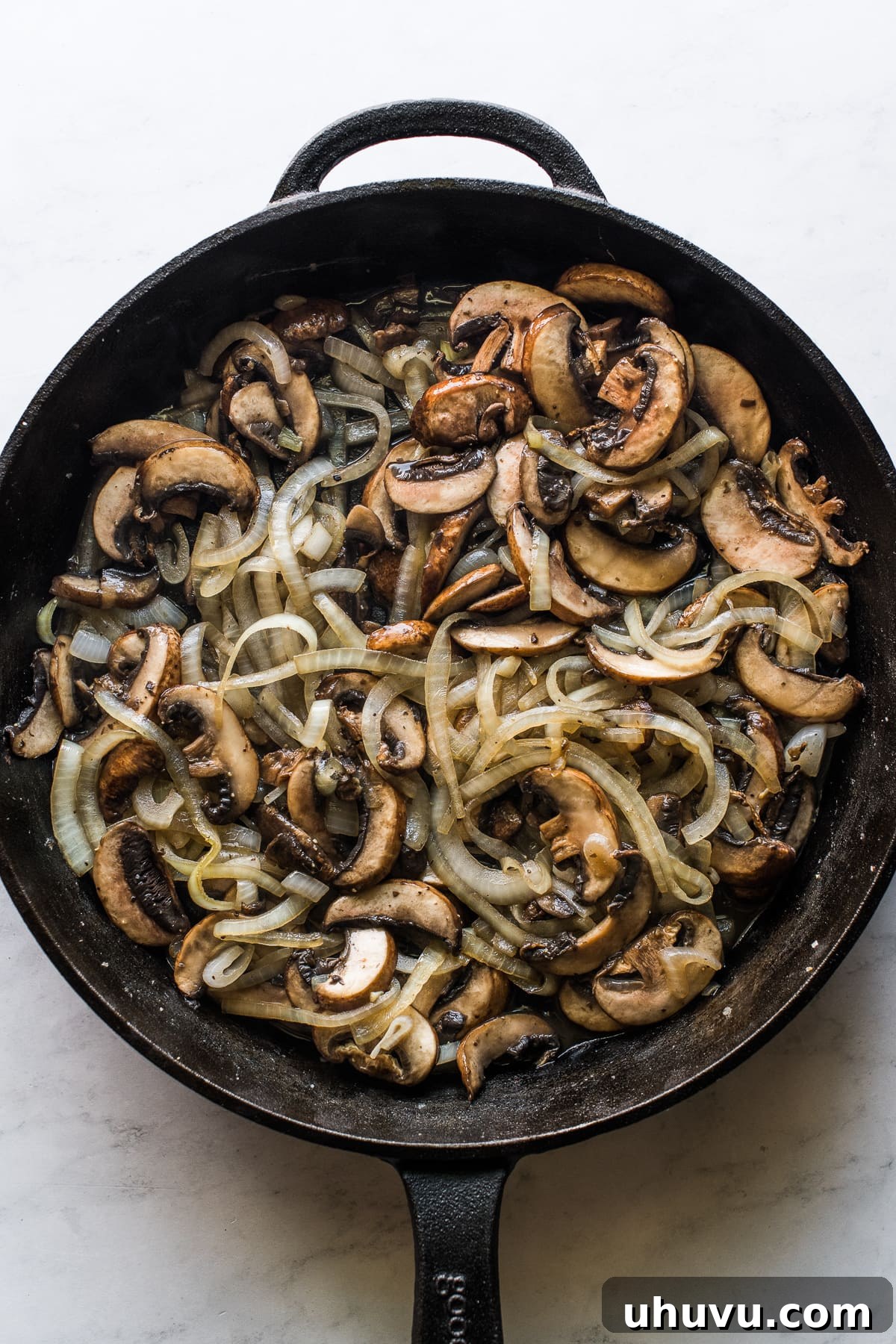 Ultimate Fresh Green Bean Bake 3 Sautéed onions and mushrooms creating a flavorful base for the green bean casserole sauce.