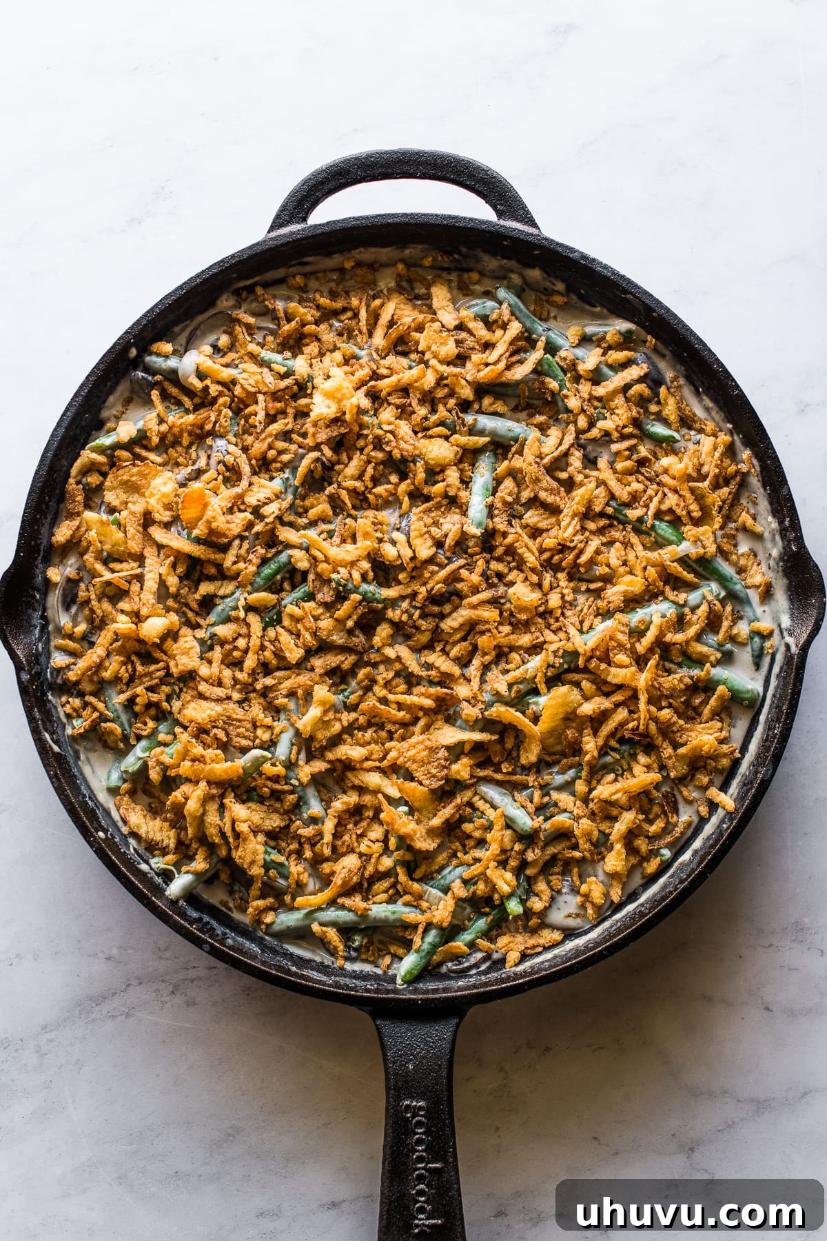 Ultimate Fresh Green Bean Bake 6 A generous layer of crispy fried onions sprinkled over the green bean casserole before baking.