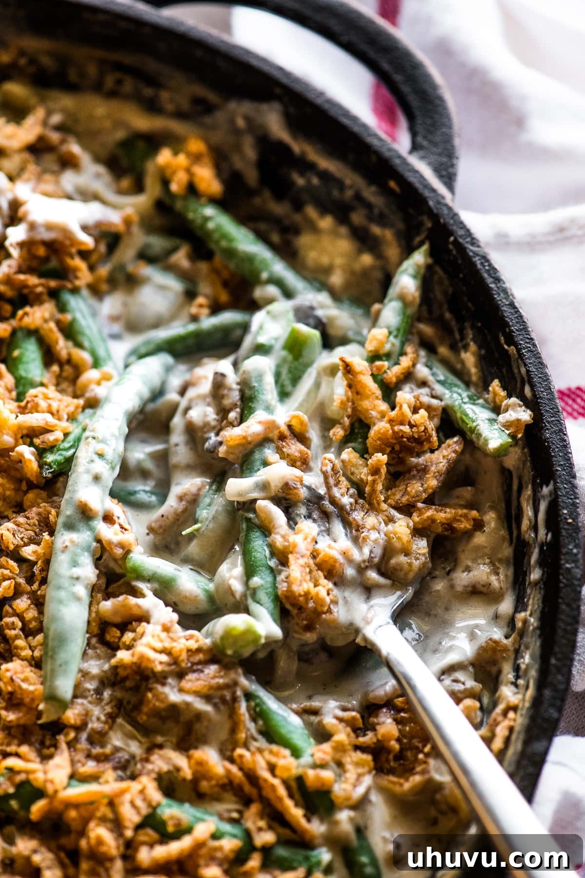 Ultimate Fresh Green Bean Bake 7 A beautifully baked, creamy green bean casserole made from scratch, glistening with golden fried onions.