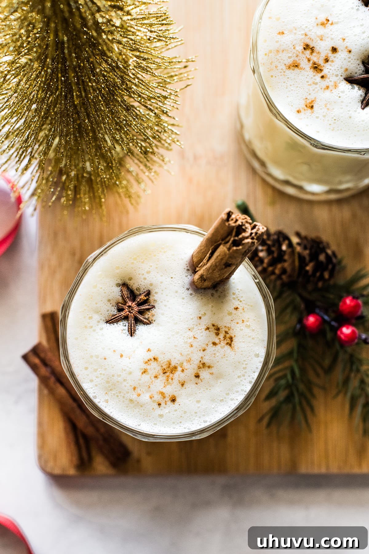 Rompope Authentic Mexican Eggnog 5 Rompope topped with ground cinnamon and a cinnamon stick.
