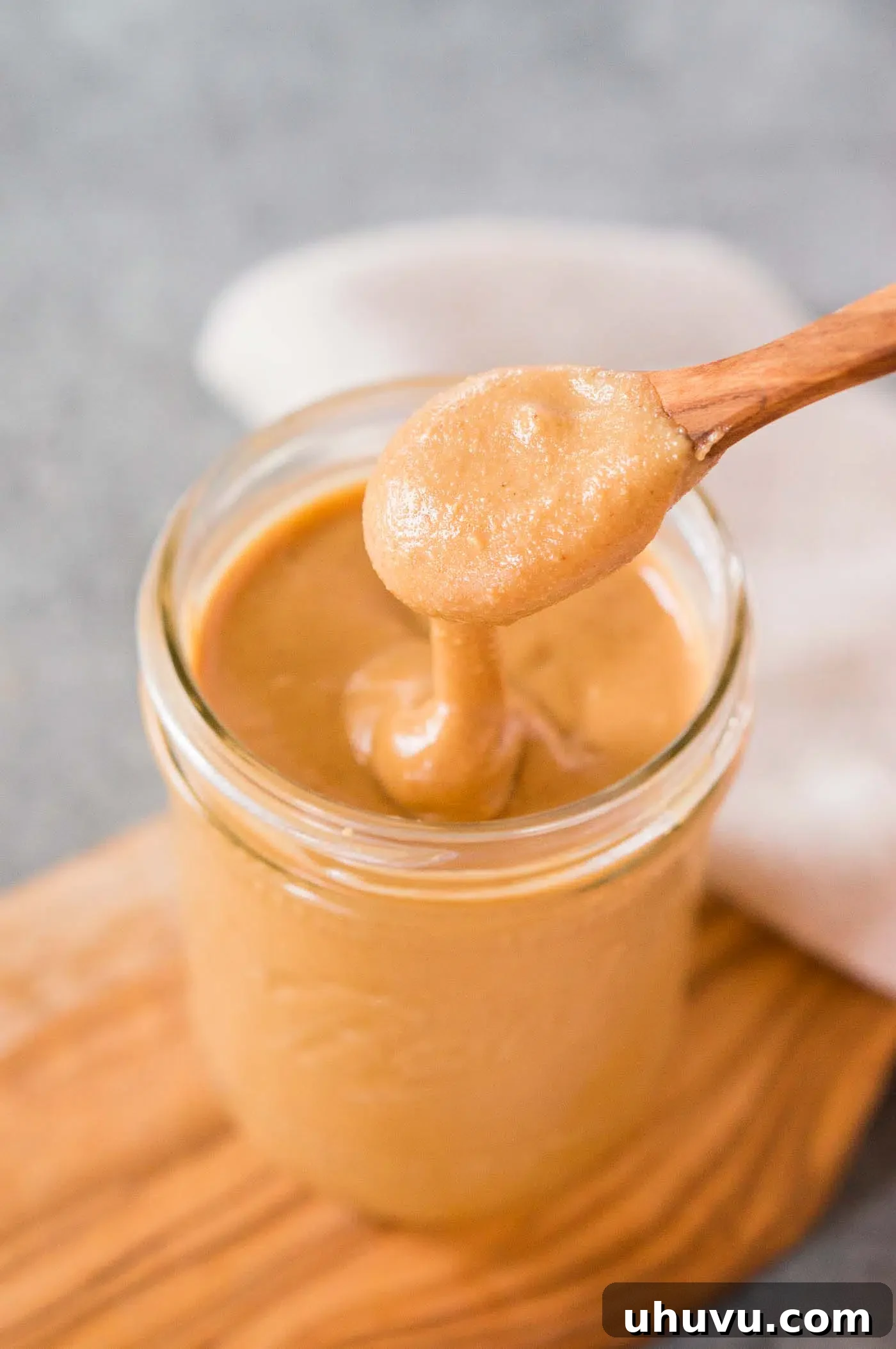 creamy homemade peanut butter in a jar, ready to be enjoyed