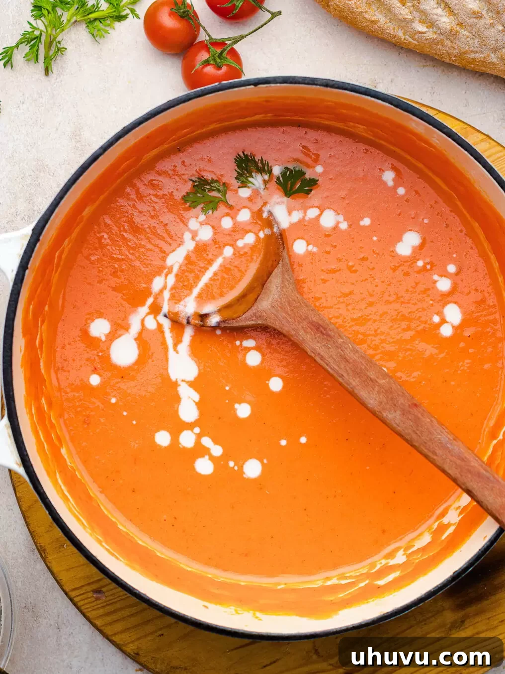 creamy tomato soup in a pot ready to serve