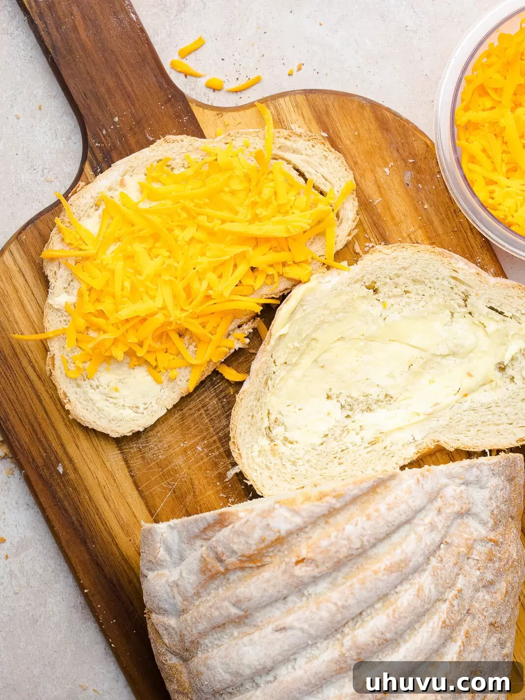preparing grilled cheese sandwiches for croutons