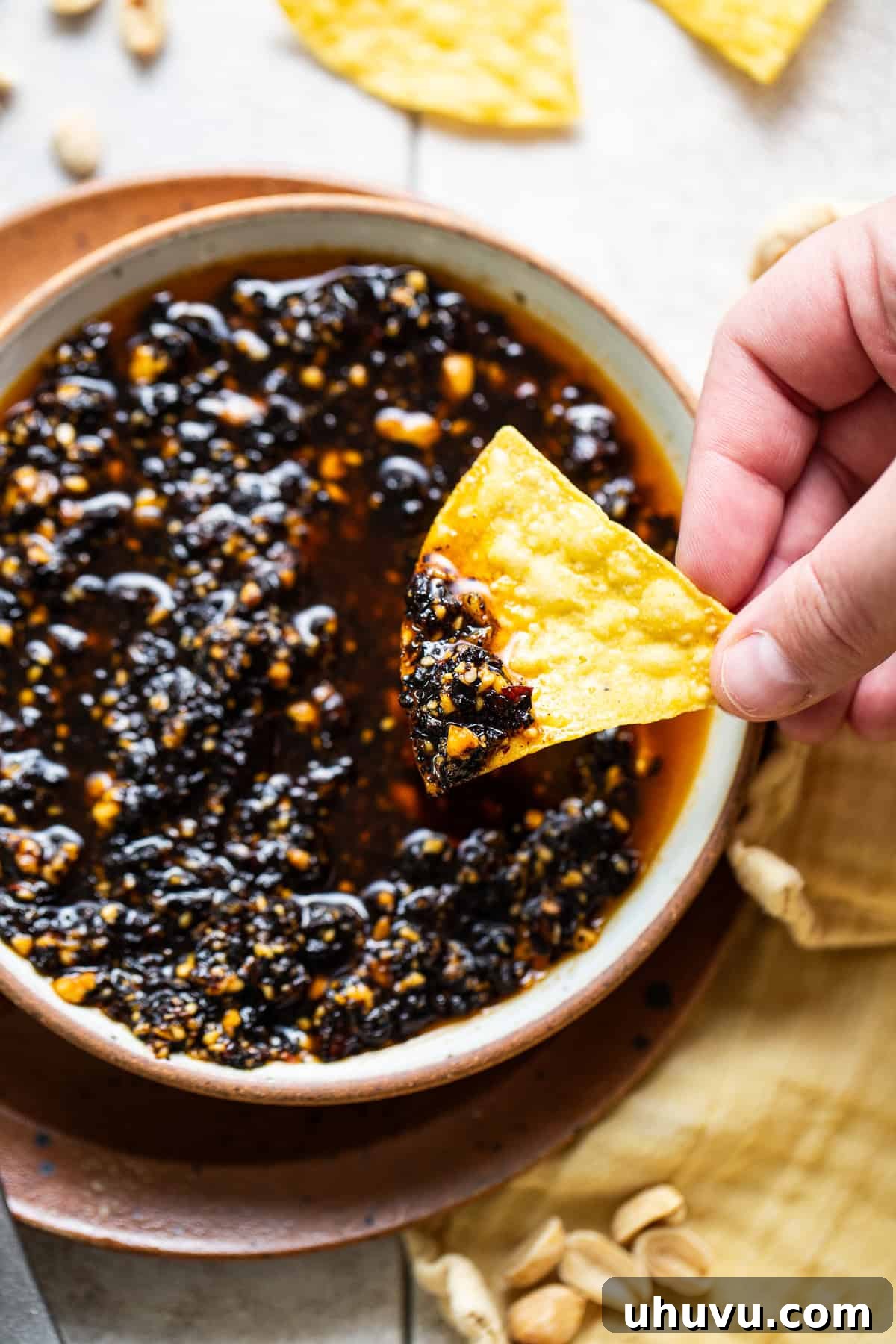 Salsa Macha spooned onto a crispy tortilla chip