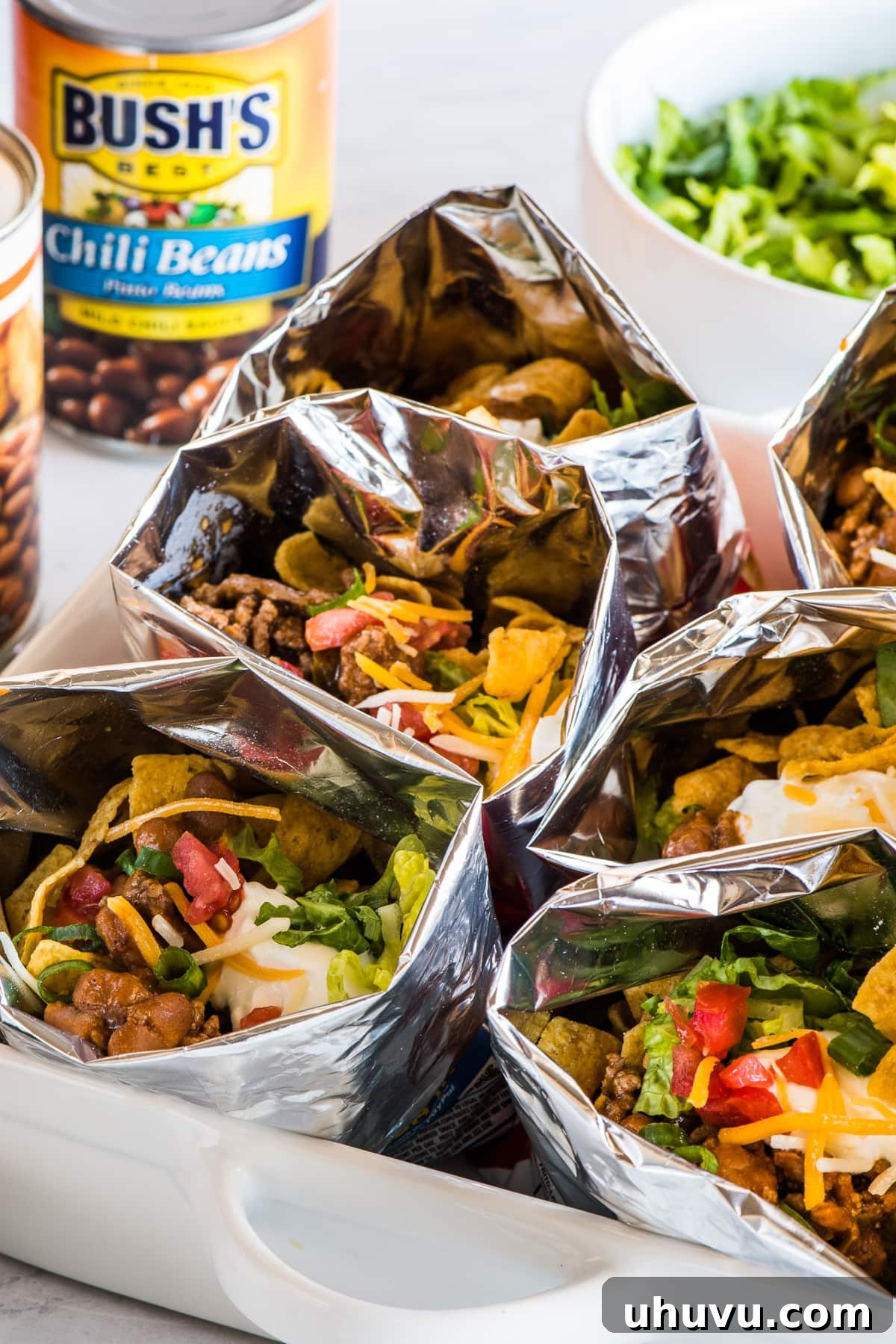 Chip Bag Tacos 6 A display of bags of walking tacos on a table, ready for guests with various toppings.