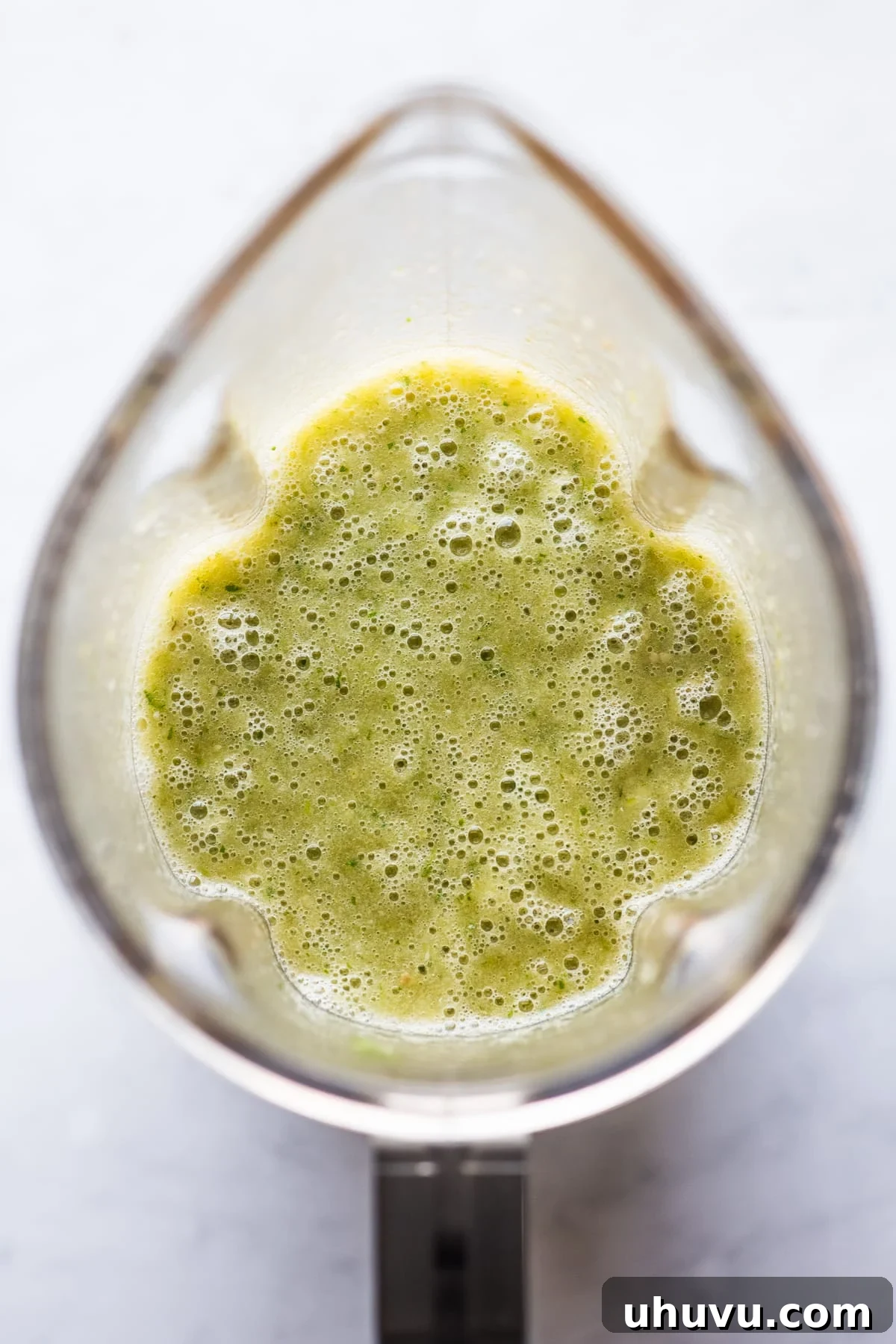 Green Chile Egg Delight 4 Freshly blended salsa verde in a blender with its vibrant green color.