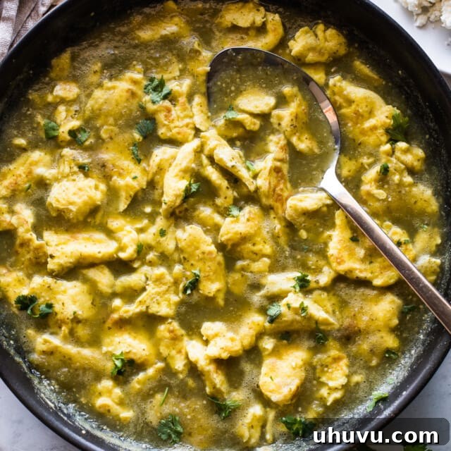 Green Chile Egg Delight 6 Huevo en chile verde (or scrambled eggs in a salsa verde) in a skillet.