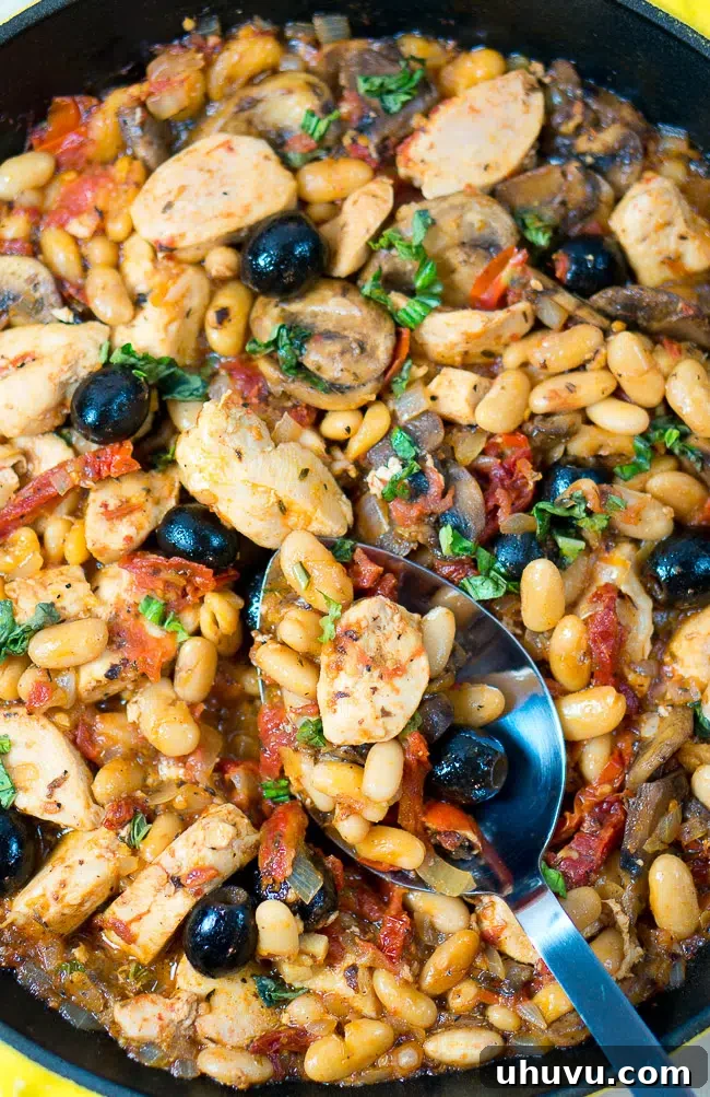 Delicious One Skillet Tuscan Chicken with creamy sauce, sun-dried tomatoes, and spinach