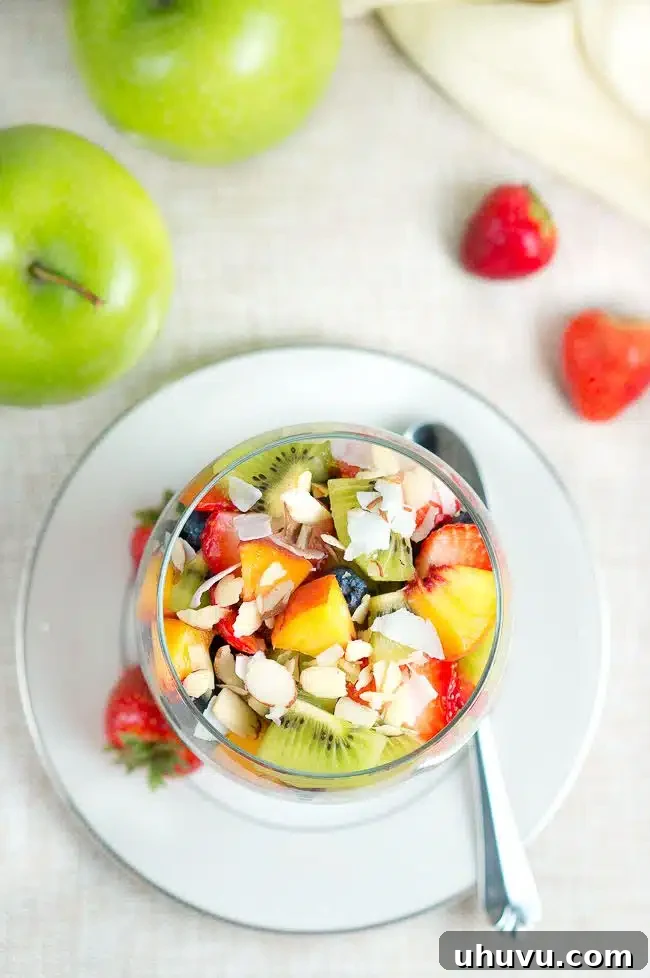A top-down view of the freshly prepared Fruit Chia Pudding Parfait, showcasing all layers
