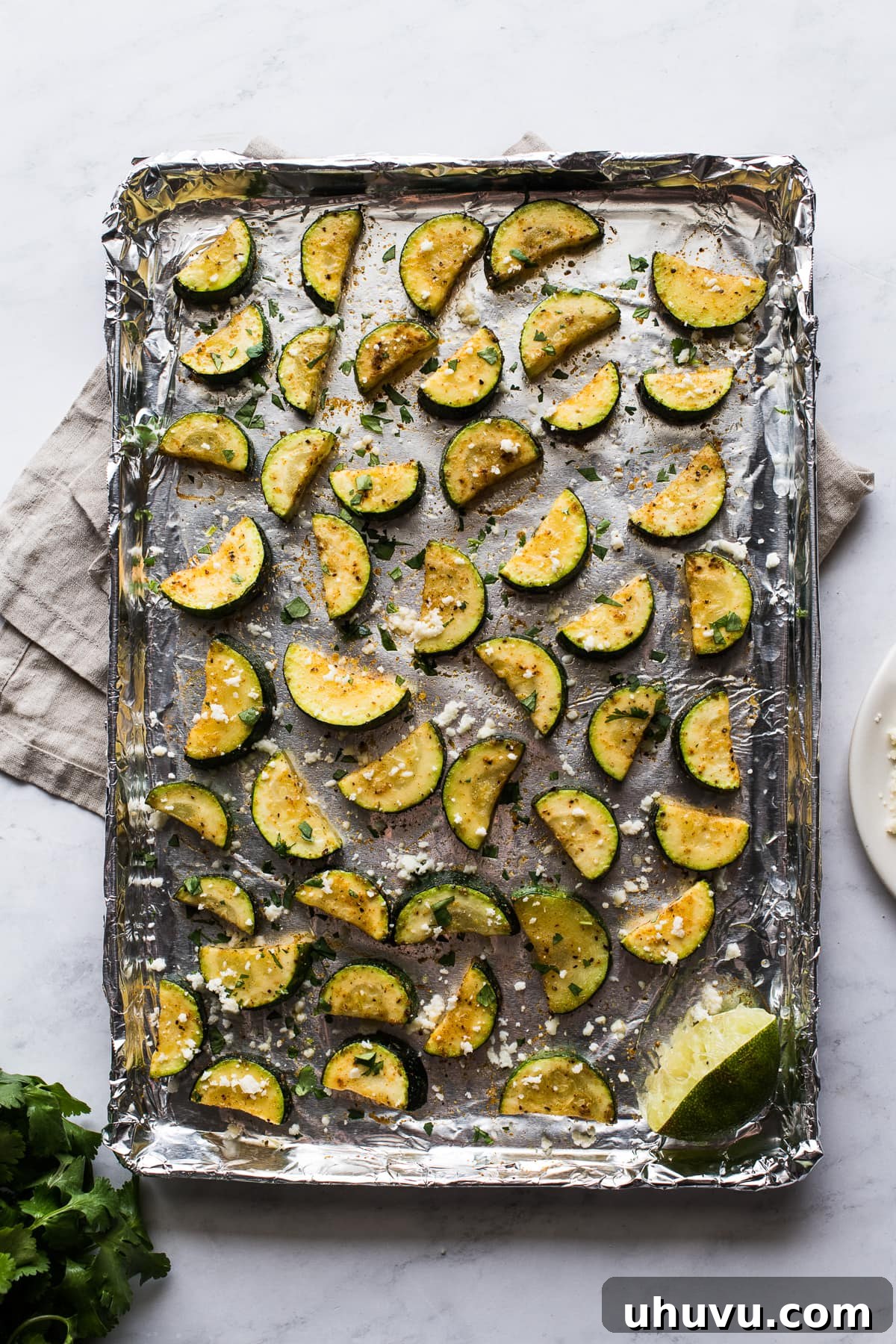 Zesty Roasted Mexican Zucchini 4 Roasted Mexican Zucchini on a sheet pan.