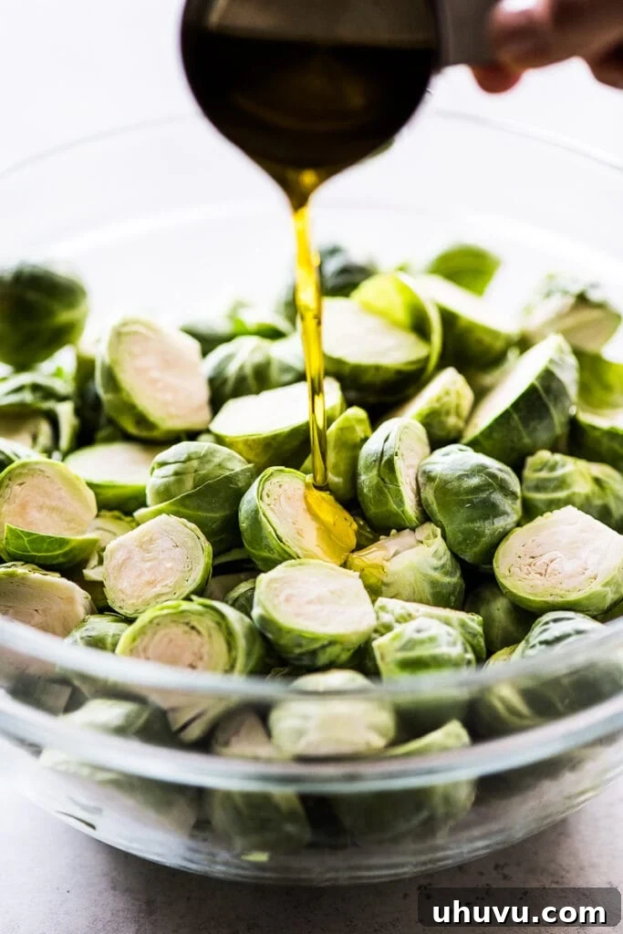 Caramelized Honey Balsamic Sprouts 3 A small bowl holding a rich, glossy honey balsamic sauce, ready to be poured over roasted vegetables.