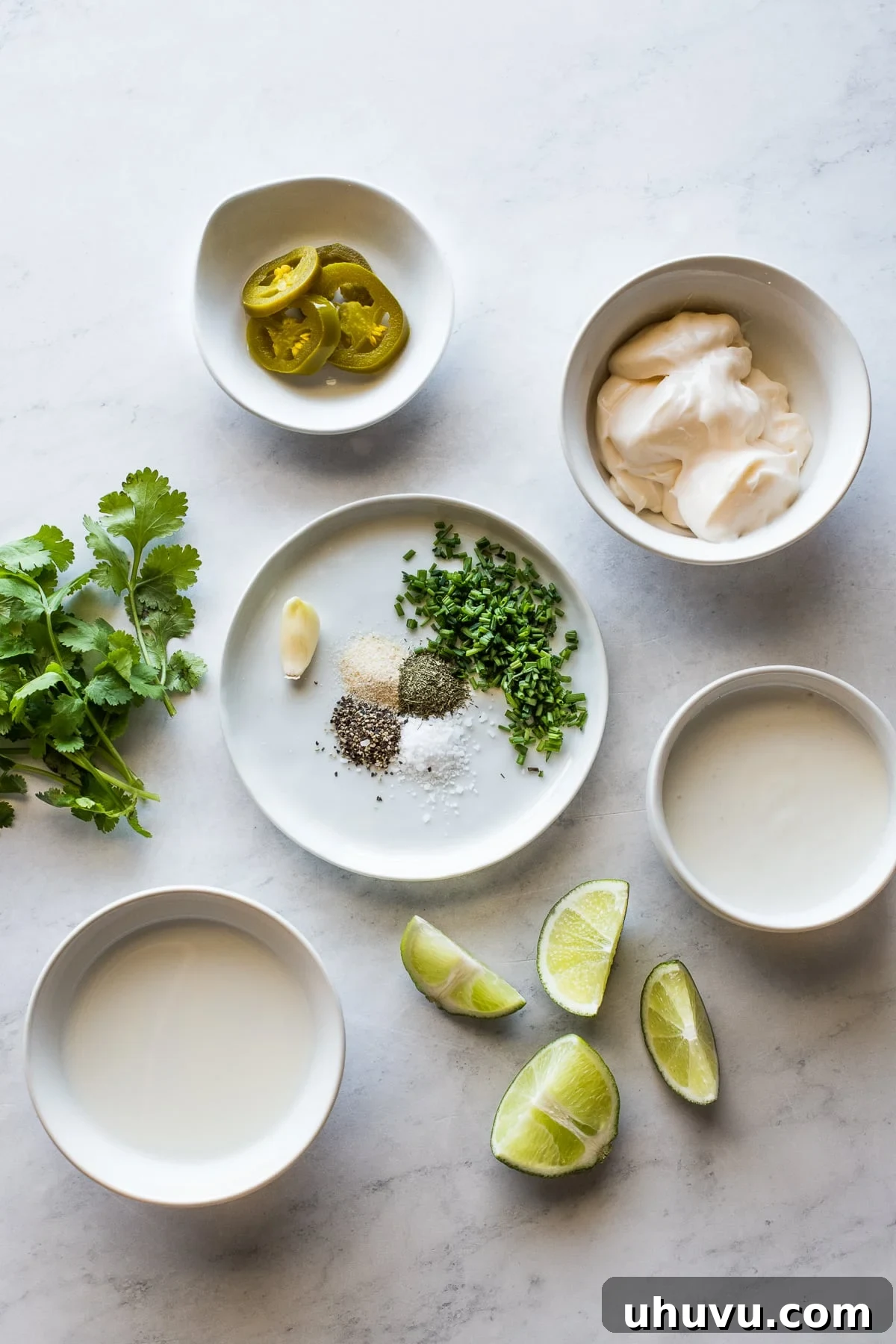 Jalapeno ranch ingredients in small individual bowls.