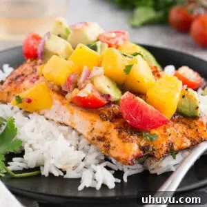 baked salmon with mango avocado salsa served over rice