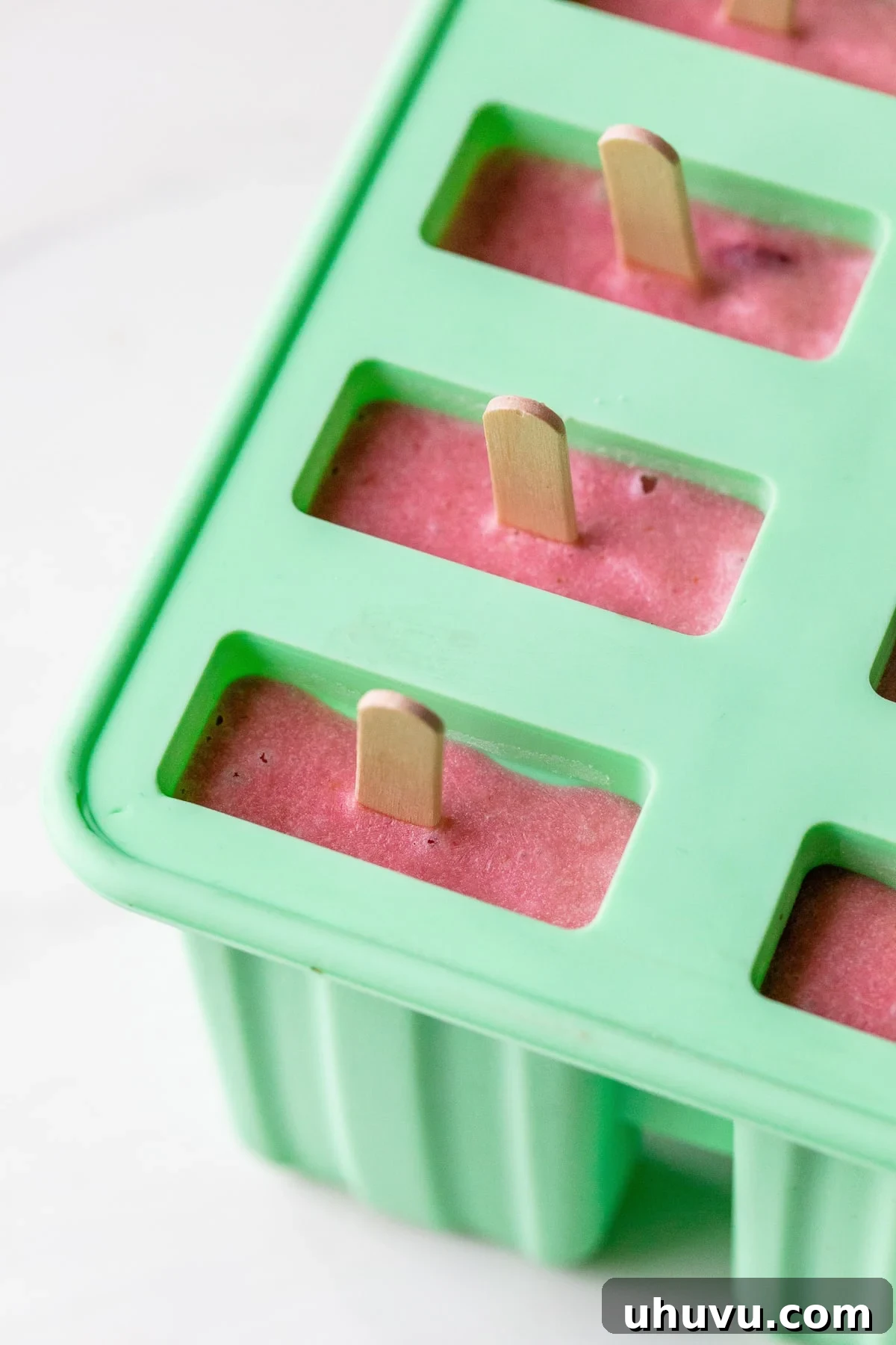 Strawberry Cloud Pops 5 Paletas in a popsicle mold.