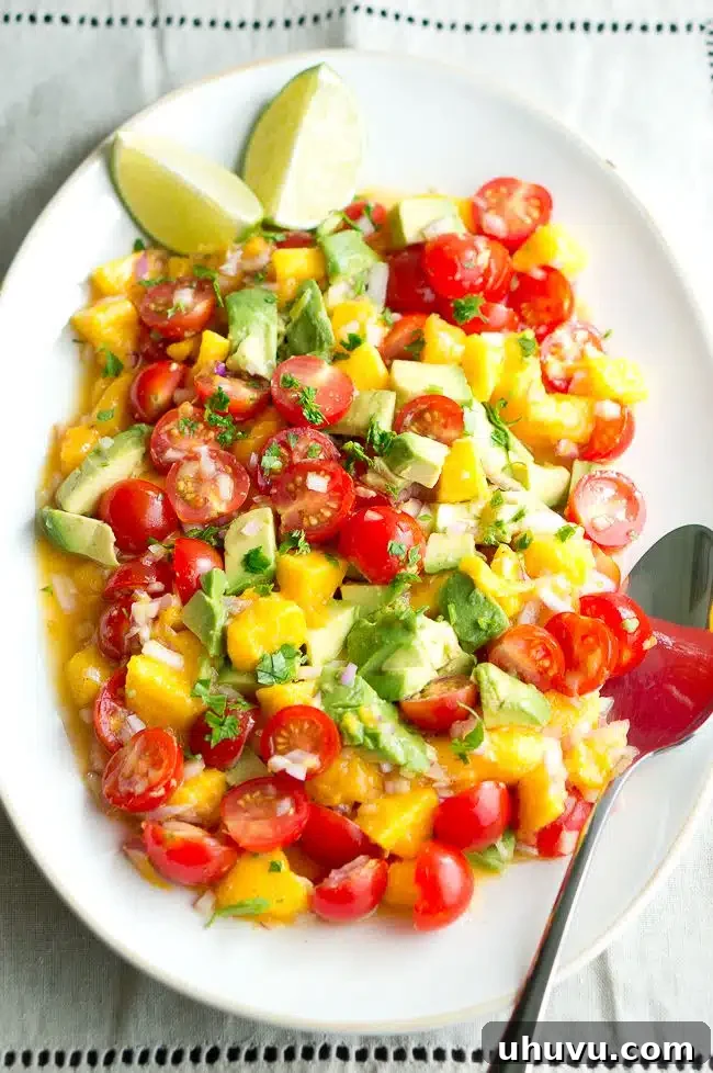 Lime wedges served alongside fresh ingredients for salsa