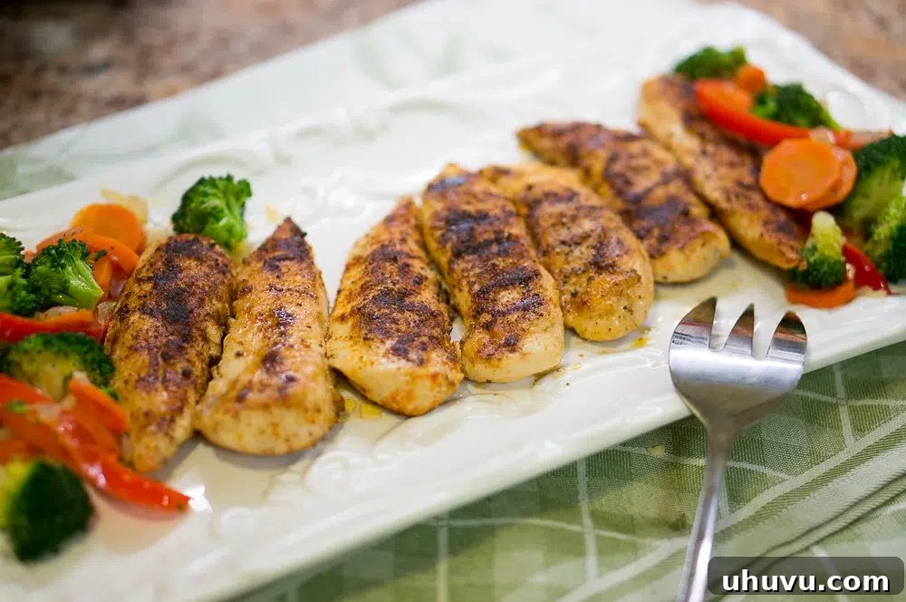 Beautifully plated Pan Grilled Chicken & Sauteed Vegetables, ready to eat