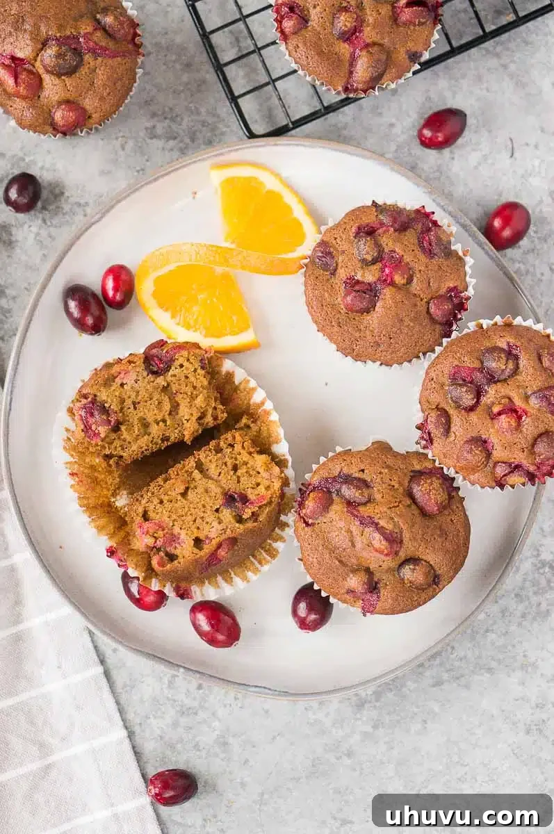 Healthy cranberry orange muffins cooling