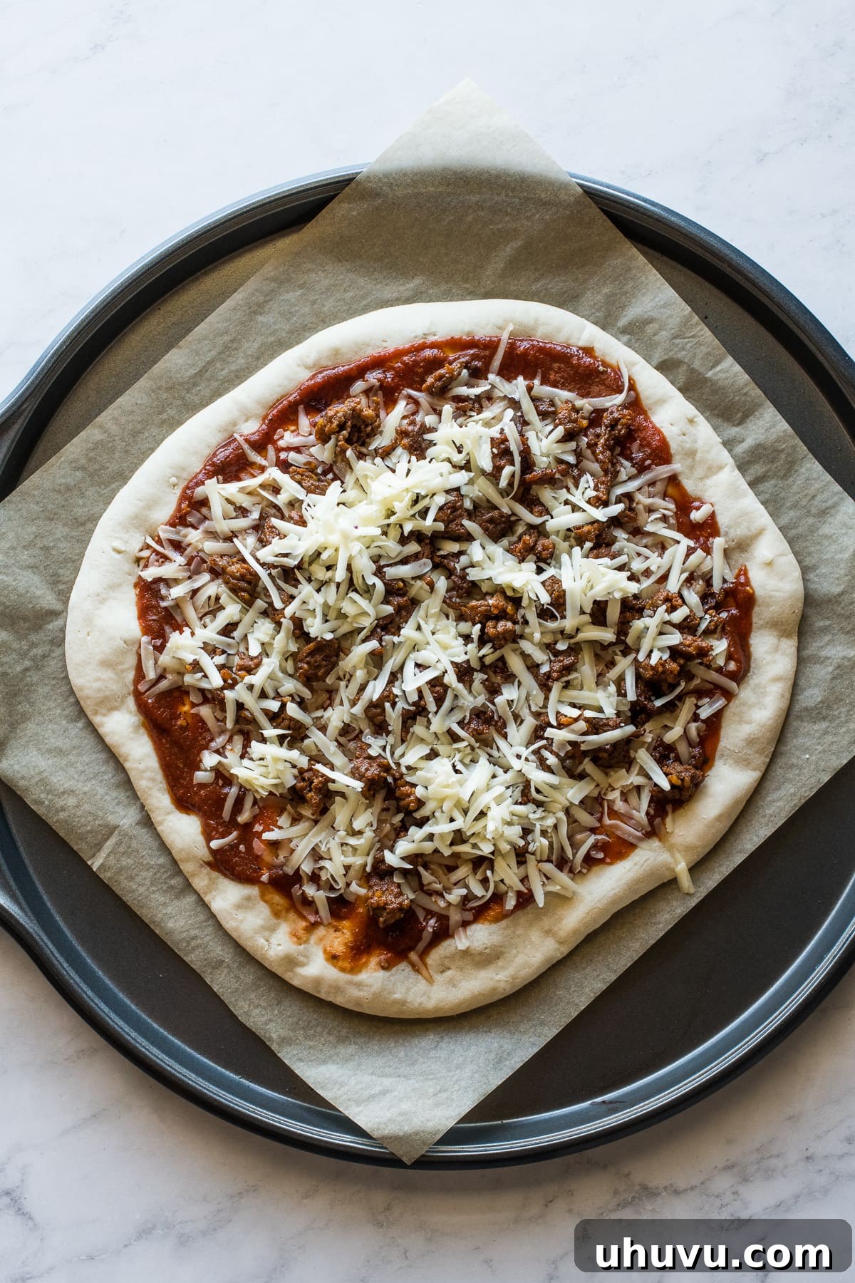 Morning Fiesta Pizza 4 Partially baked pizza crust topped with chipotle tomato sauce, cheese, and crumbled Mexican chorizo.