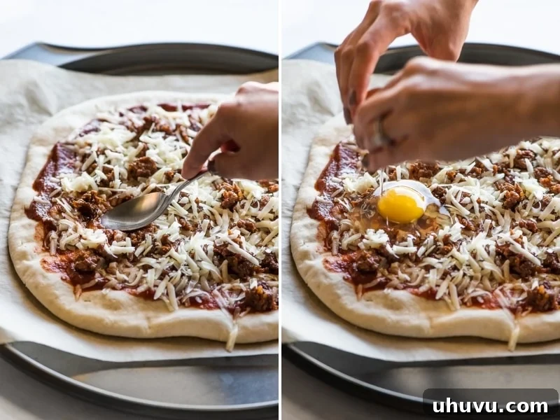 Morning Fiesta Pizza 5 A hand gently cracking a fresh egg directly onto a Mexican Breakfast Pizza, creating a perfect well for baking.