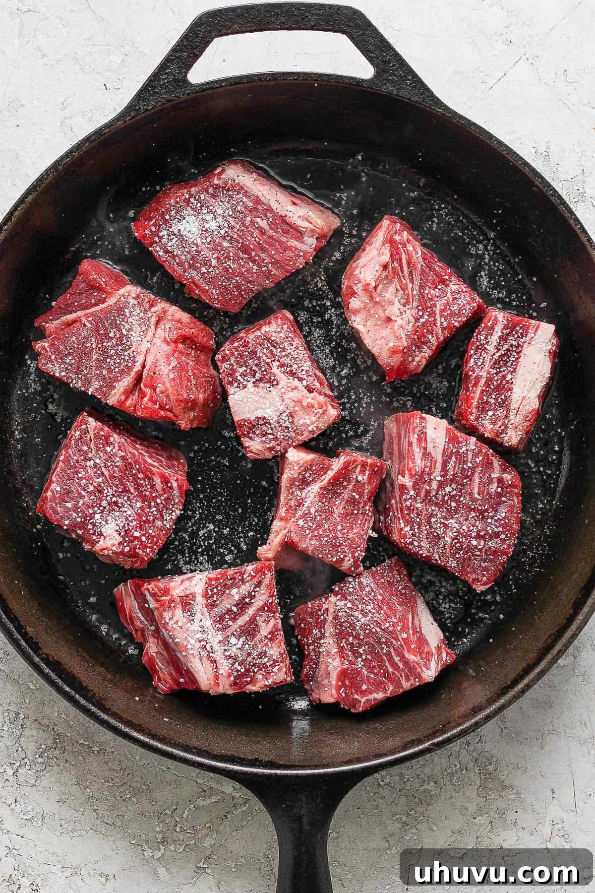 Smoky Chipotle Shredded Beef 5 Seasoned beef placed on a skillet