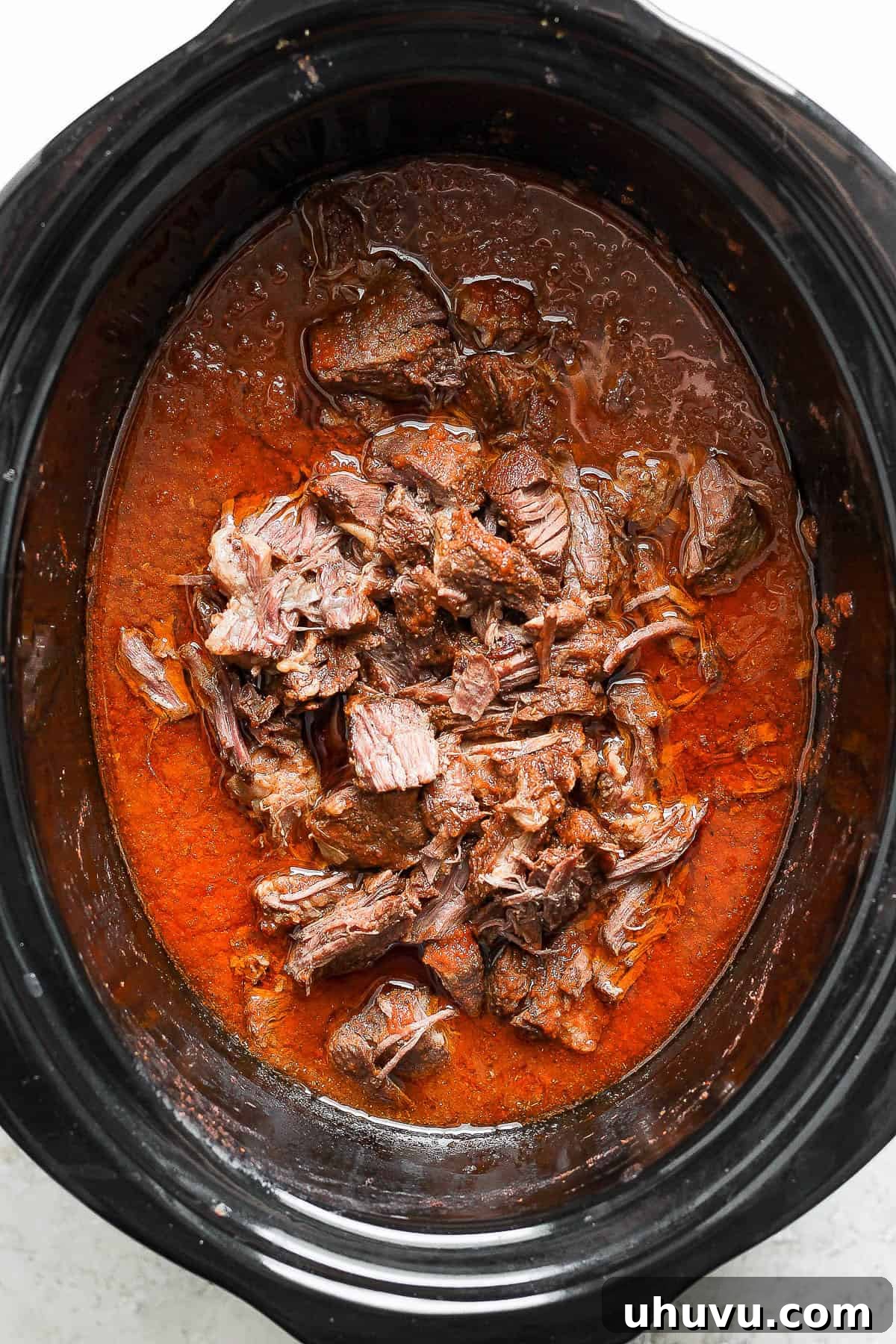 Smoky Chipotle Shredded Beef 10 Beef is shredded and added back into the crockpot