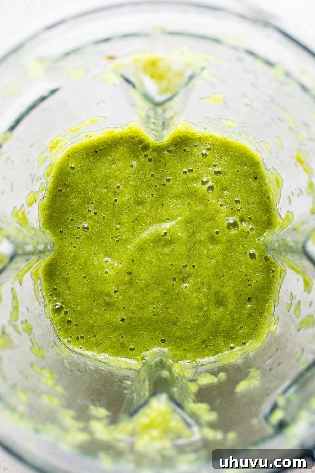 Zesty Green Enchiladas 4 A blended salsa verde in a large blender.