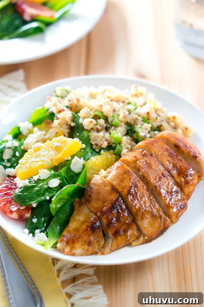 Finished Balsamic-Glazed Chicken Salad served with Quinoa and Citrus Spinach