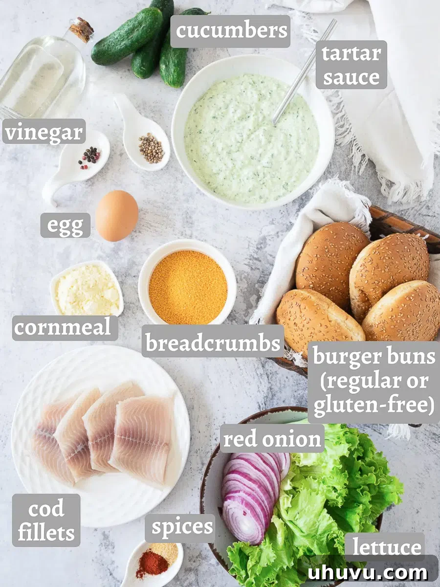 Ingredients laid out for making a fish burger, including fish fillets, breading, and toppings