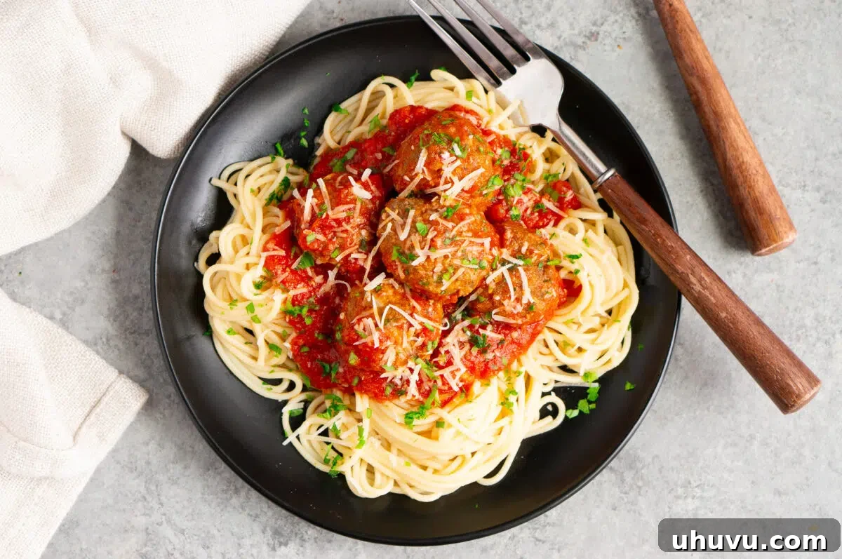 Classic Italian meatballs served over spaghetti with marinara sauce