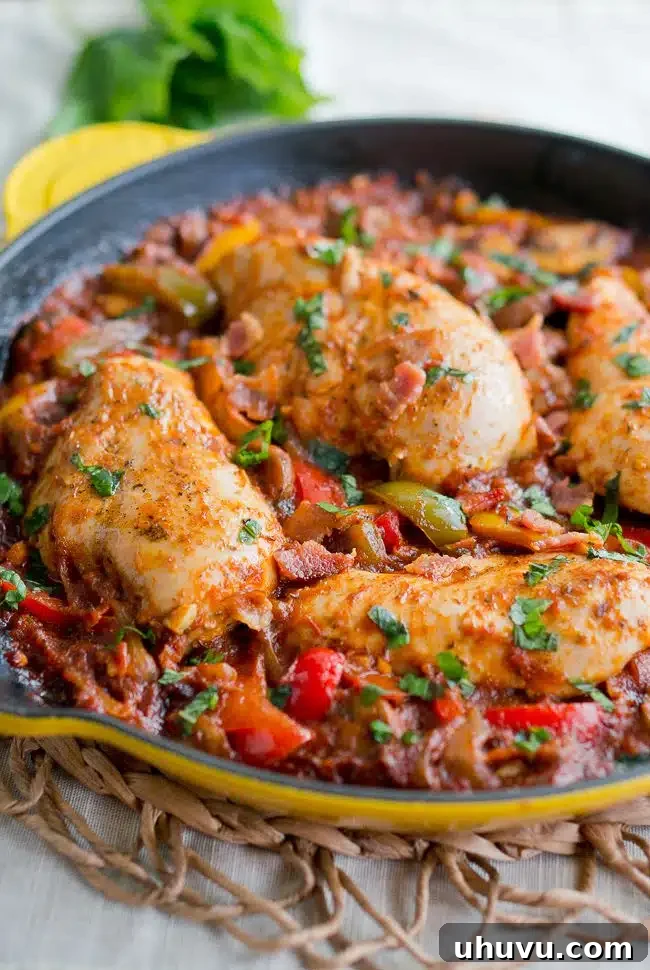 15 Cozy Comfort Meals Made Simple 16 One Skillet Chicken Cacciatore - Rustic Italian chicken with bell peppers, onions, and tomatoes in a rich sauce, made in one pan.