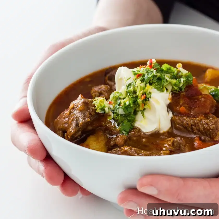 15 Cozy Comfort Meals Made Simple 8 Goulash Soup with Gremolata - A hearty Hungarian beef soup with a fresh, zesty herb topping.