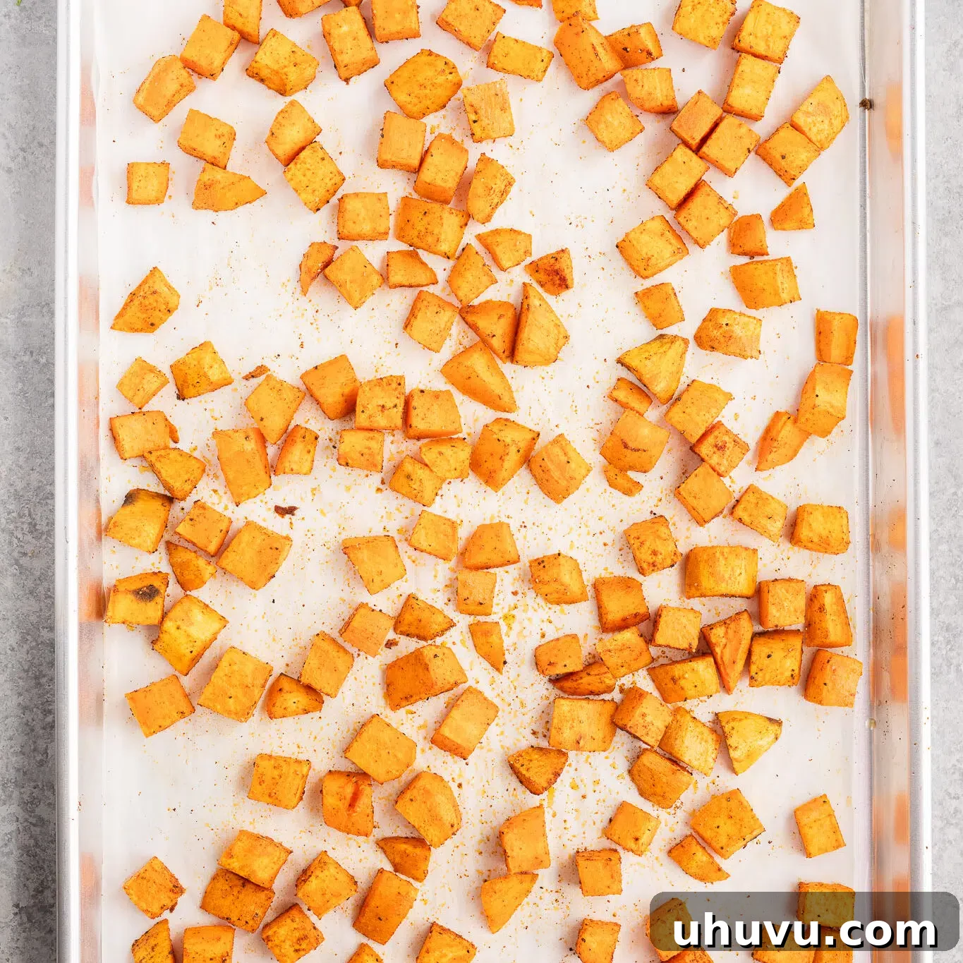 Vibrant Sweet Potato Black Bean Bowls 6 roasted sweet potatoes on a baking sheet in the oven
