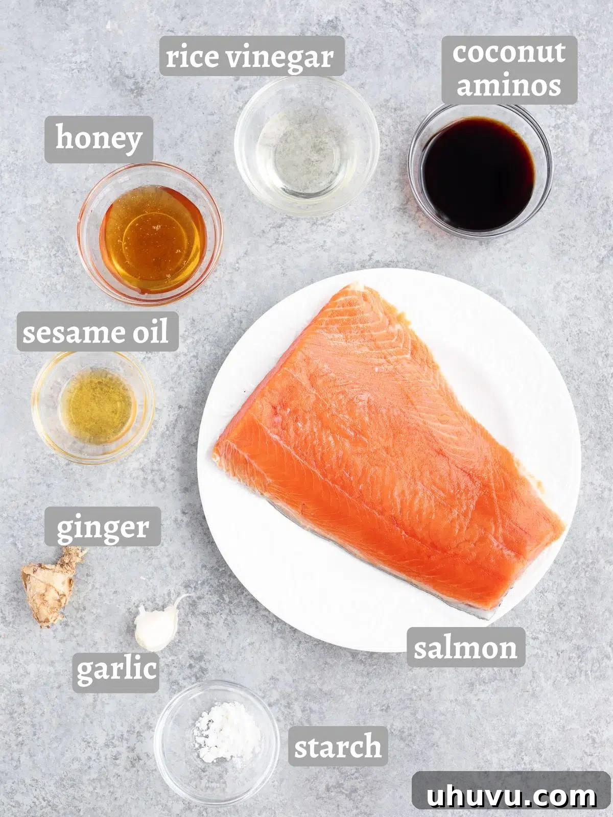 Fresh ingredients for the teriyaki salmon: ginger, garlic, coconut aminos, honey.