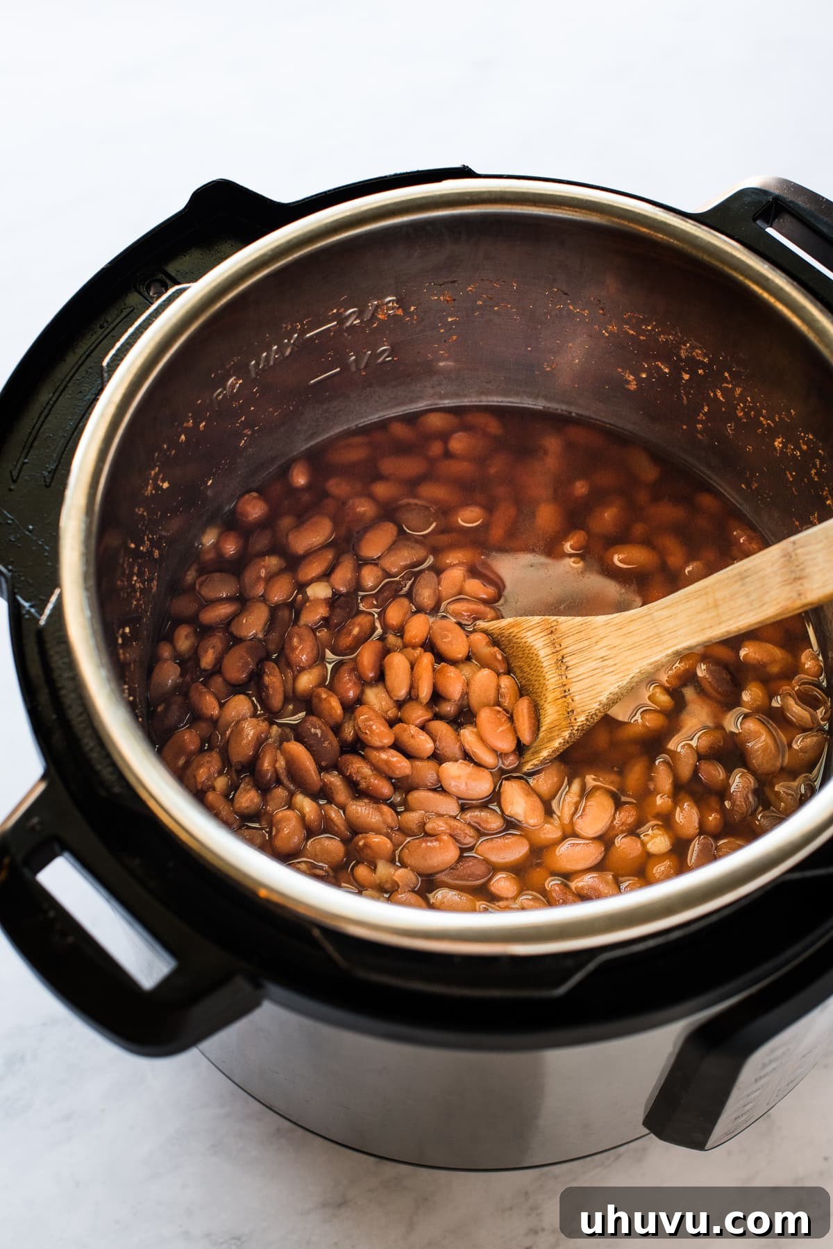 Quick and Creamy Instant Pot Refried Beans 4 Cooked pinto beans in the Instant Pot.
