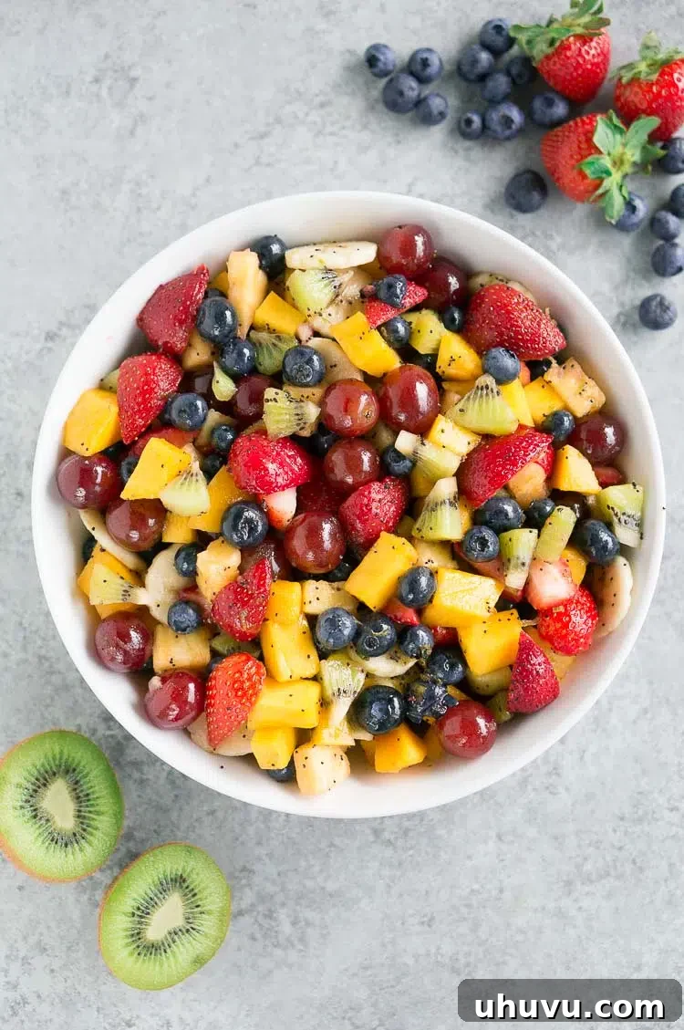 Vibrant honey lime fruit salad with a variety of fresh fruits