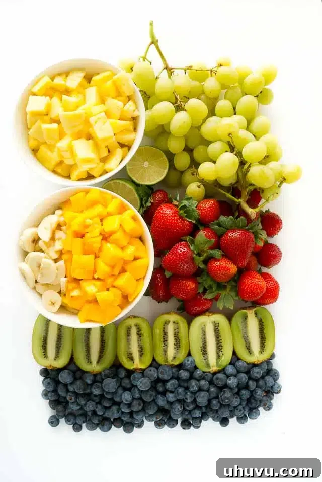 Close-up of a bowl of Honey Lime Fruit Salad, highlighting the fresh fruit and dressing