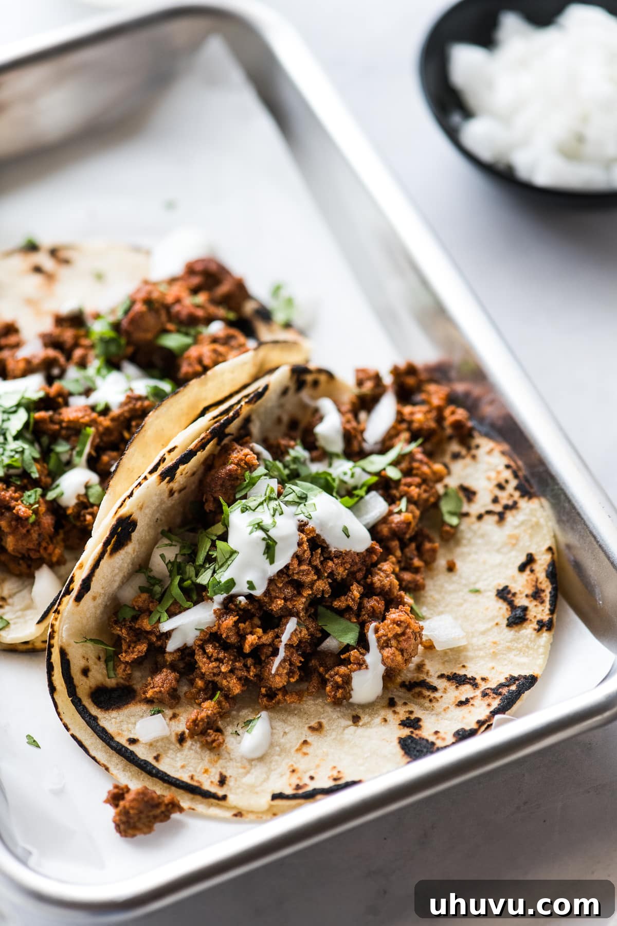 Craveable Chorizo Tacos 5 Chorizo tacos ready to be eaten.