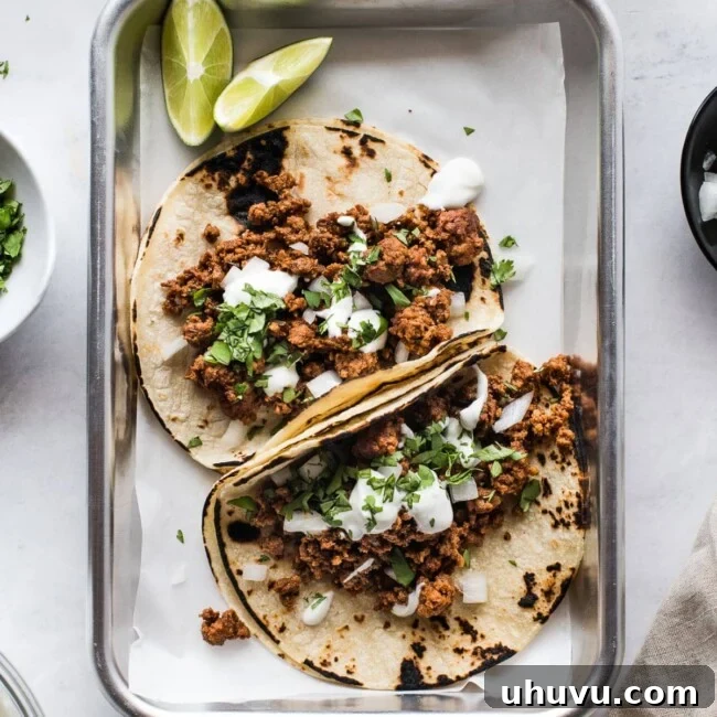 Craveable Chorizo Tacos 6 Chorizo tacos topped with lime crema and cilantro.