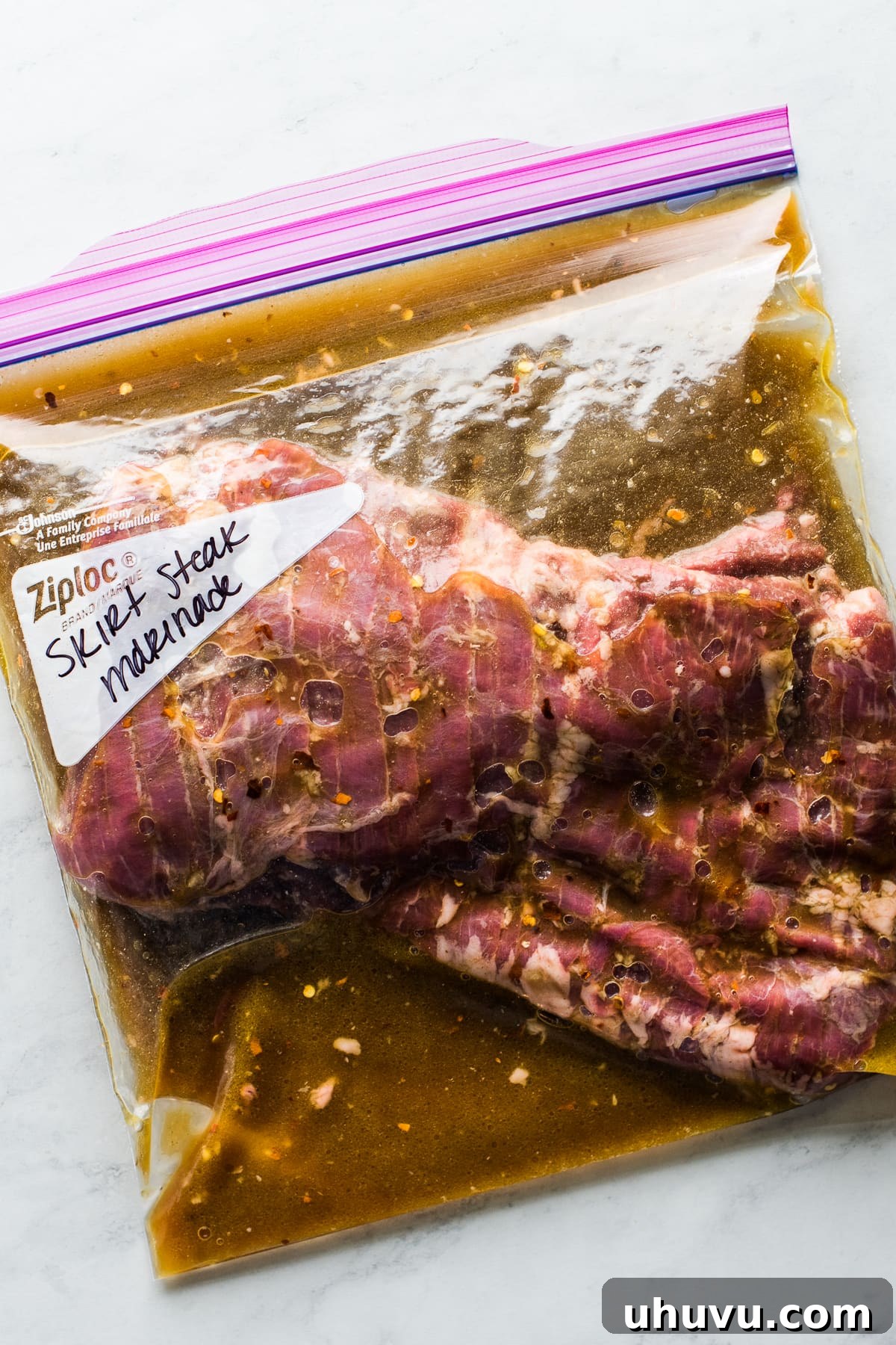Skirt Steak Flavor Boost 4 Skirt steak marinade in a plastic ziploc bag ready to go in the fridge.