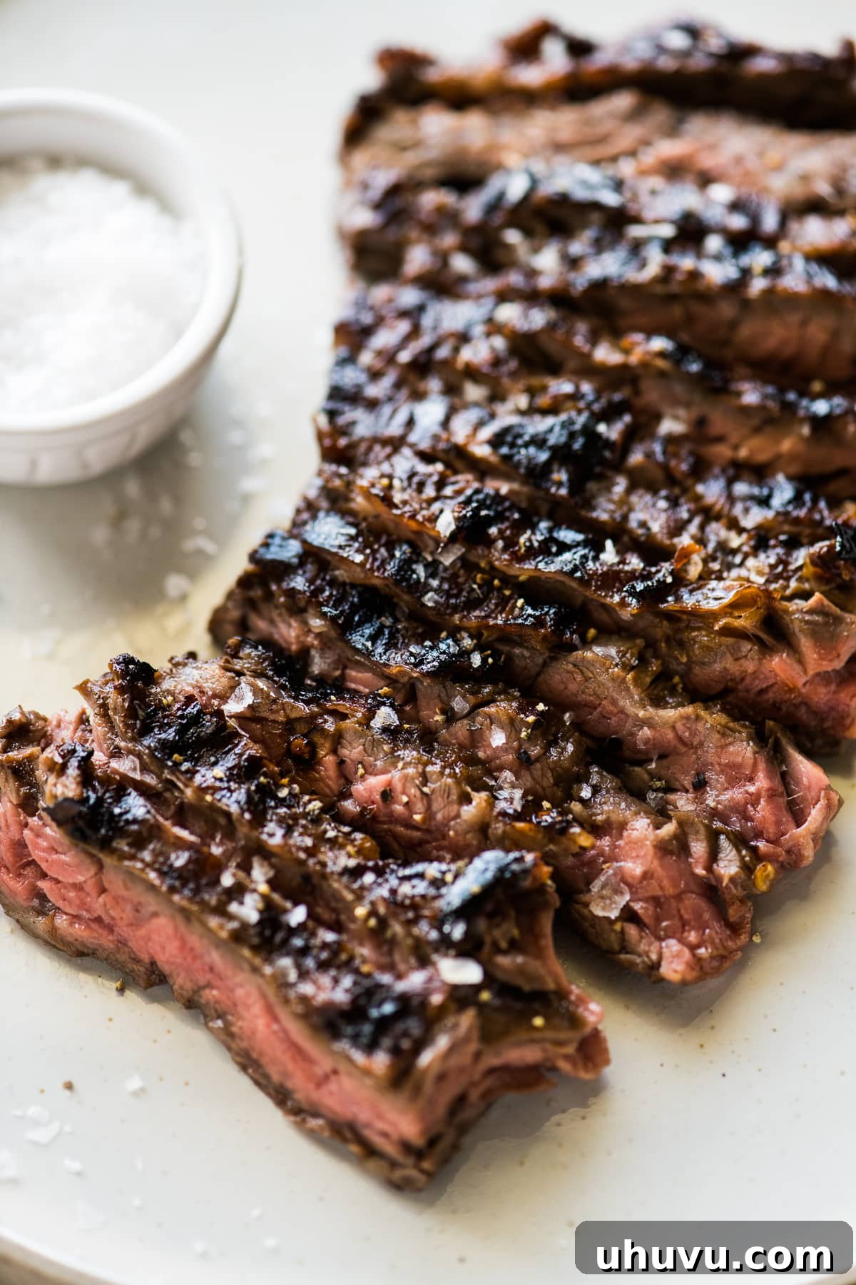 Skirt Steak Flavor Boost 5 Thinly sliced marinated grilled skirt steak that was cut against the grain to further tenderize the meat.