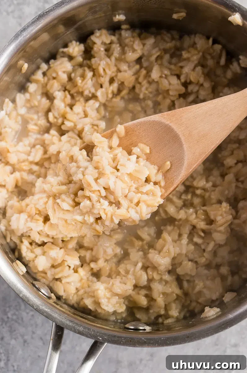 stirring oatmeal in a pot