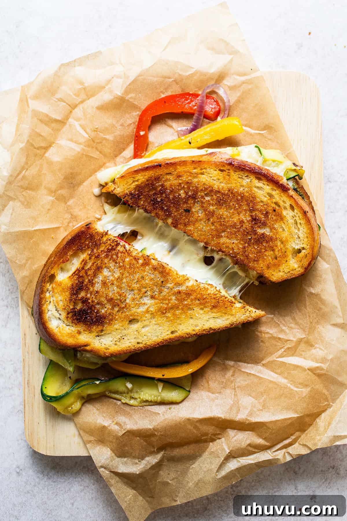 Tex-Mex Grilled Cheese 7 Fajita grilled cheese cut in half showing the cheese pull.