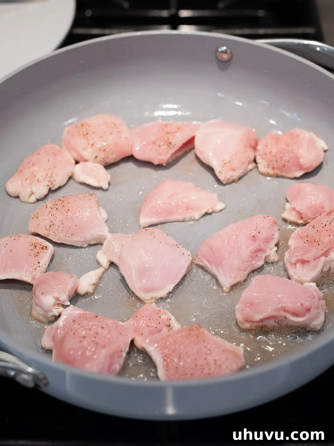 cooking chicken in a skillet